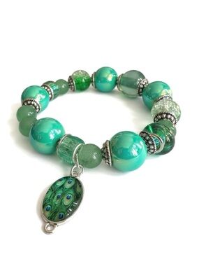 Handcrafted Green Beaded Stretch Bracelet with Peacock Charm